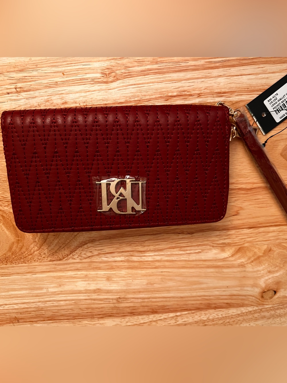 Vegan leather quilted clutch with phone pocket and wristlet